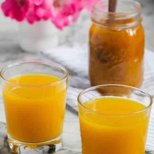 two glasses of mango panha and jar of mango jam
