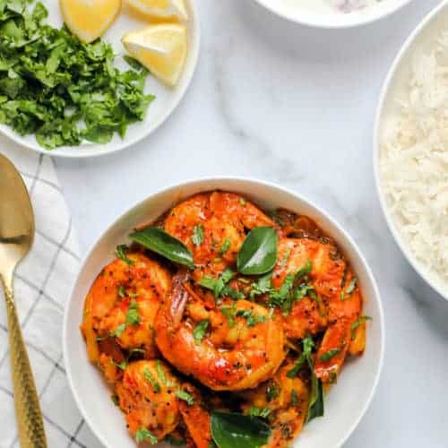 Malabar Shrimp Curry Served with, rice, raita and lemon wedges