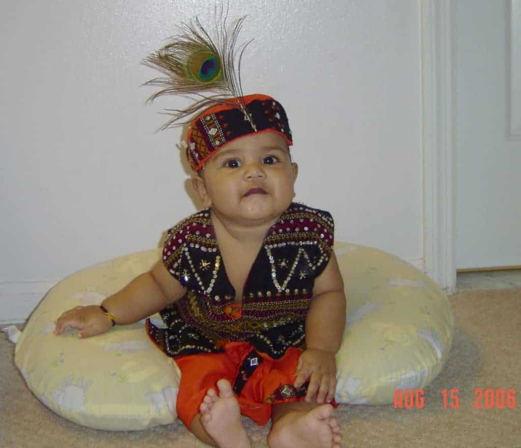 photo of a baby dressed as krishna 