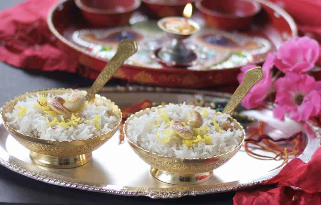 coconut rice served in 2 silver bowls 