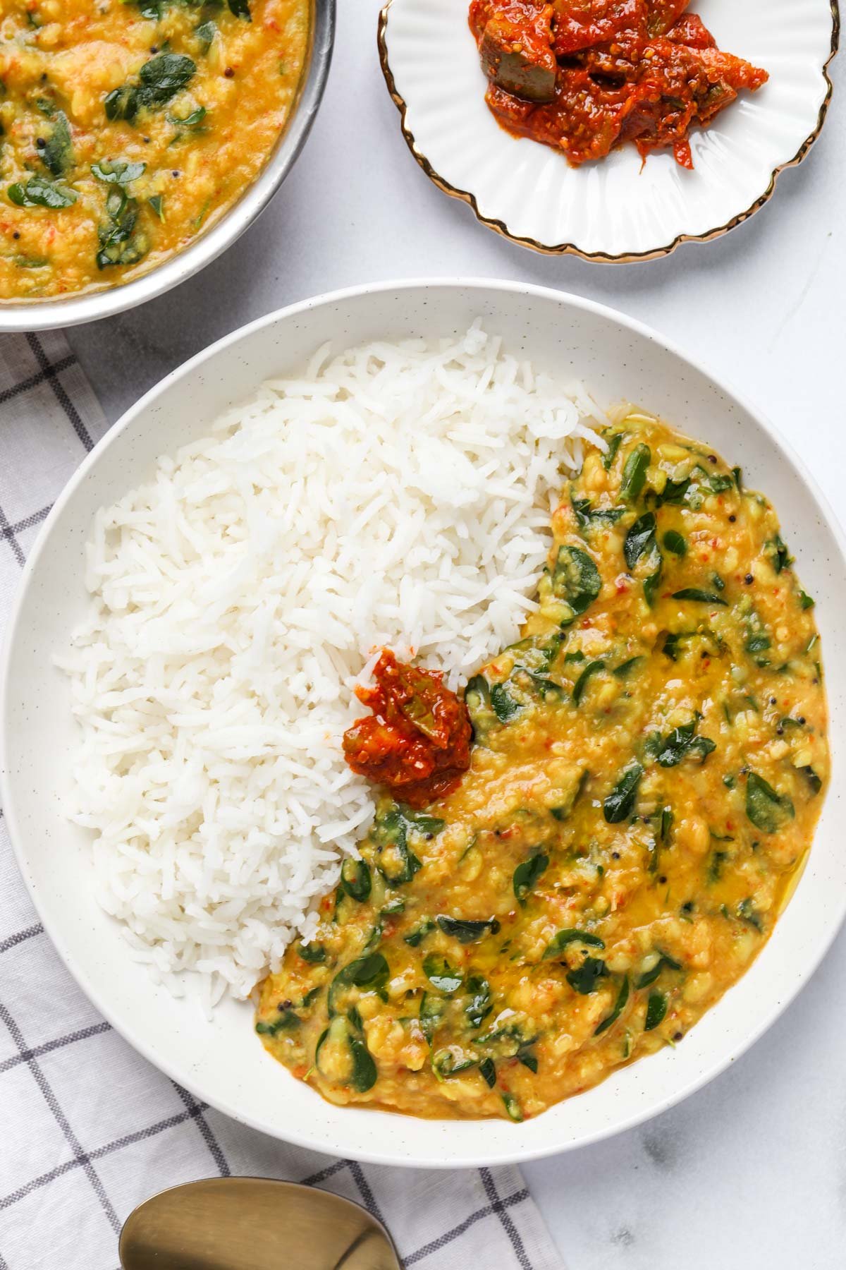 moringa dal served with rice and and achar 