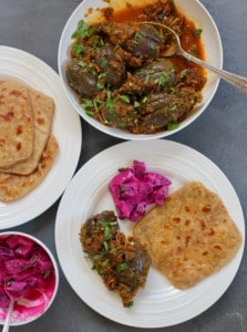 baingan masala with parathas and raita