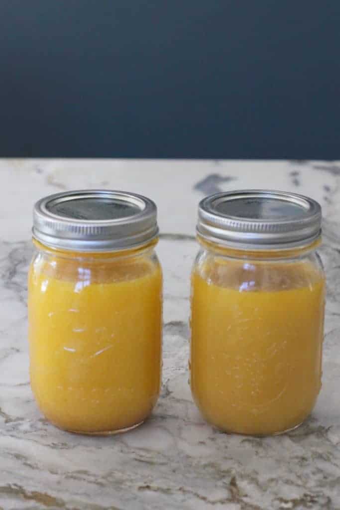 2 Mason jars filled with ghee 