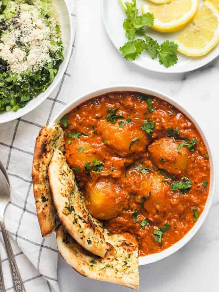 dum aloo served with naan