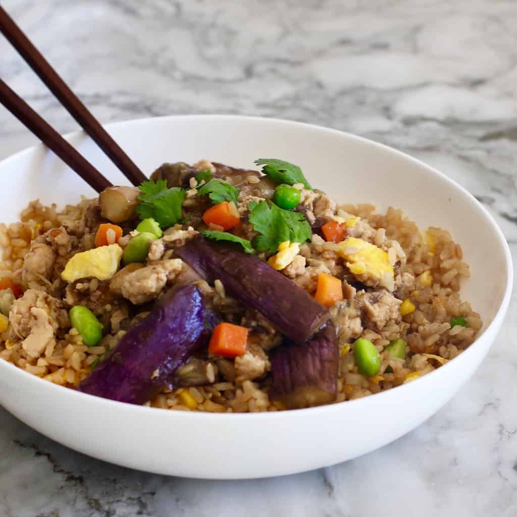 chicken and eggplant served over fried rice 