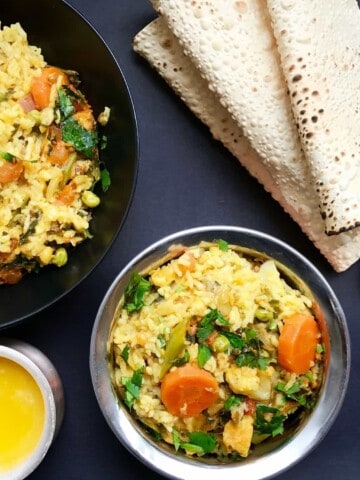 Mixed lentils khichdi served with papad