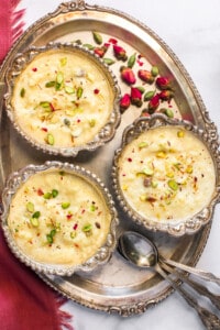 rice kheer served in 3 silver bowls