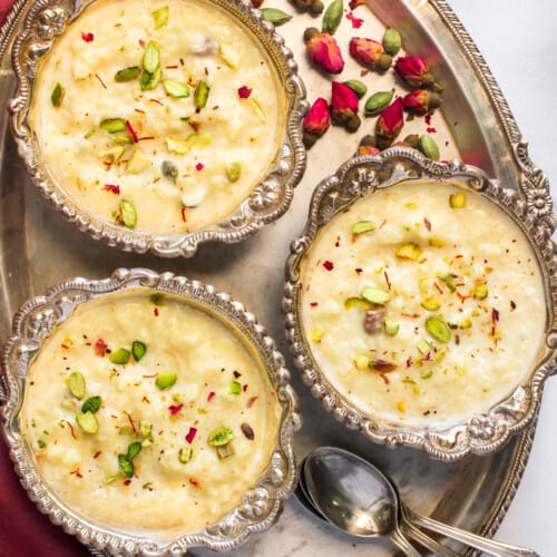 rice kheer served in 3 silver bowls