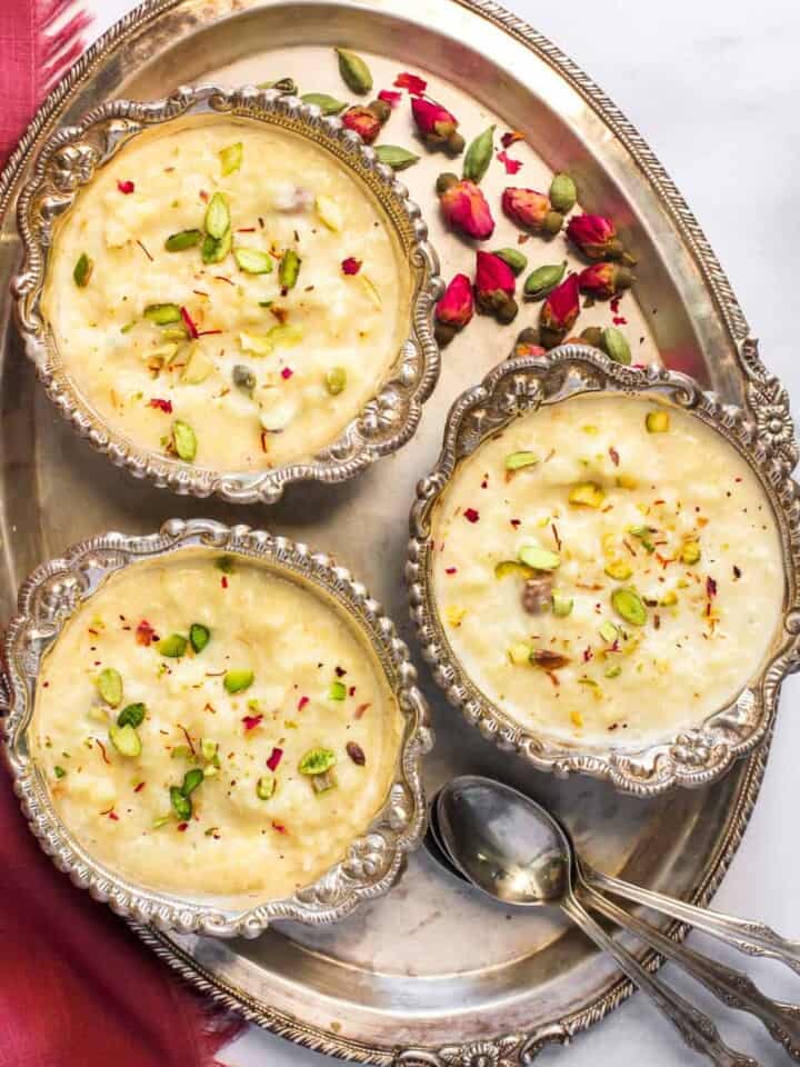 rice kheer served in 3 silver bowls