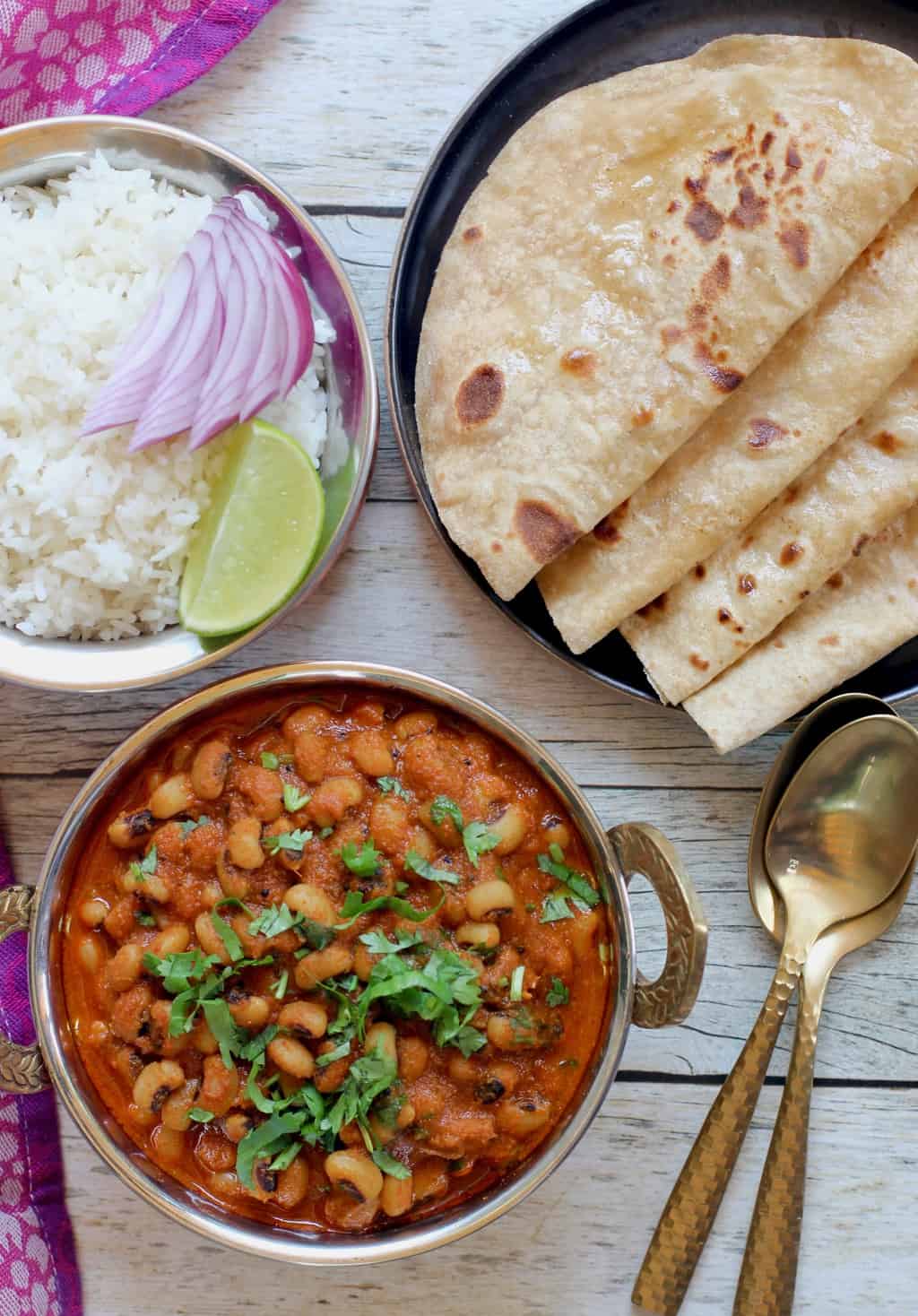 black eyed peas curry served with roti and rice
