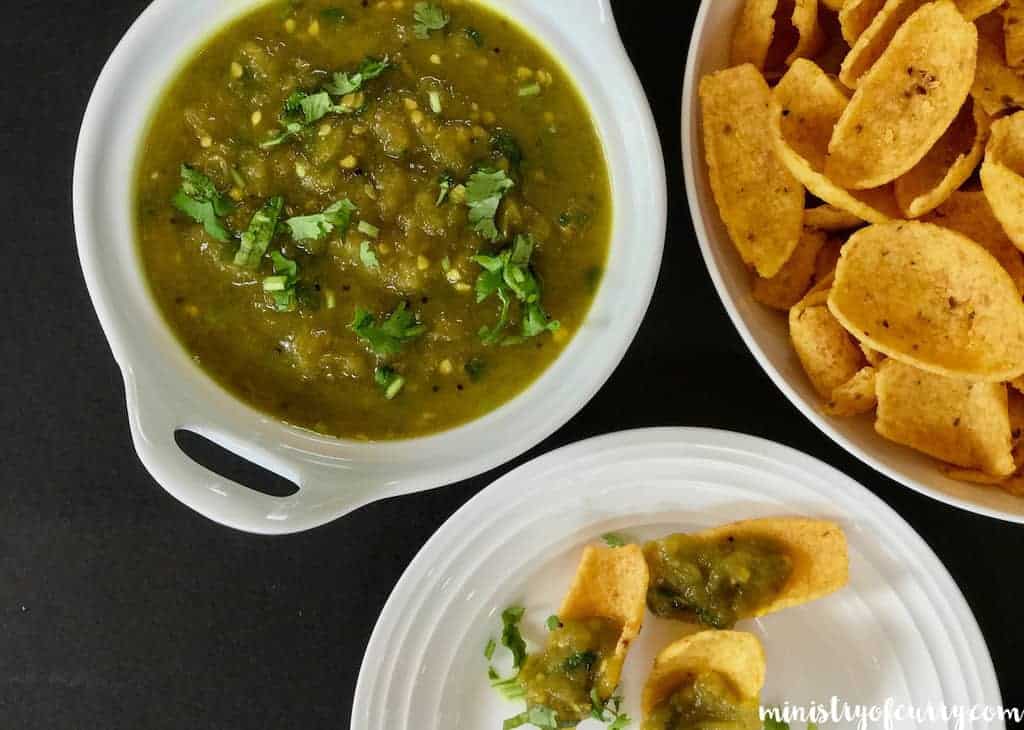green tomato chutney served with chips