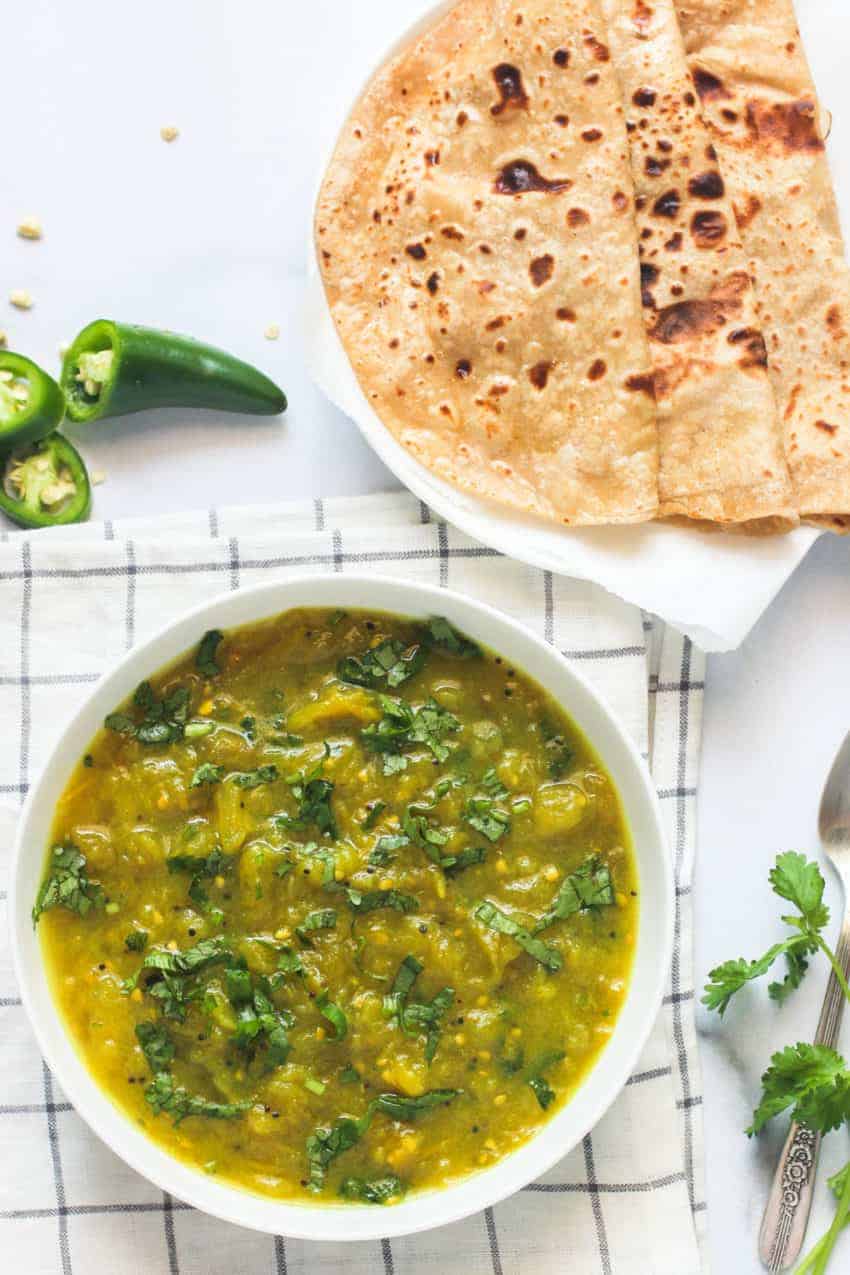 green tomato chutney served  with parathas