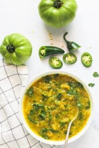 green tomato chutney in a white bowl