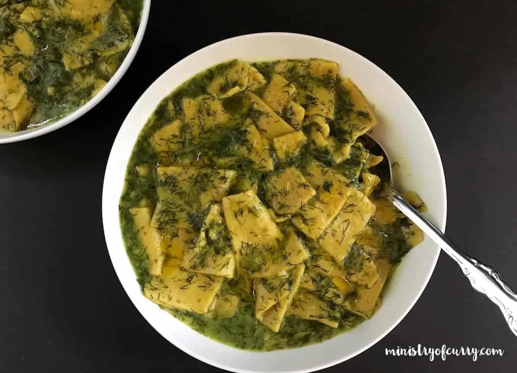 dill dhokli served in white bowls 