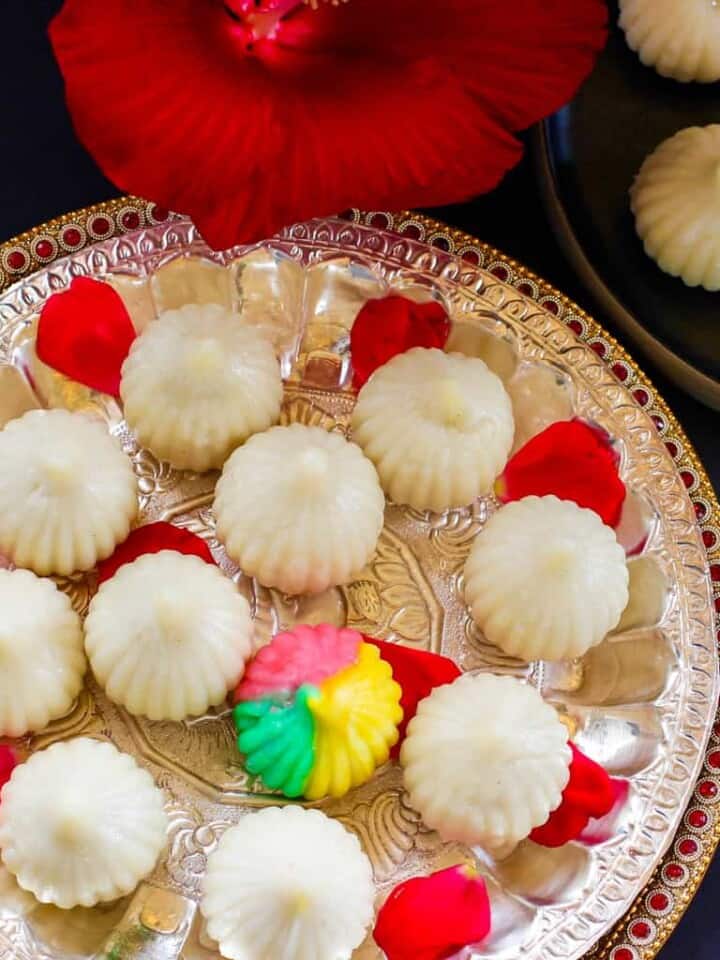 ukadiche modak in a silver platter with a tri color modak
