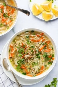 chicken cilantro soup served in a white bowl