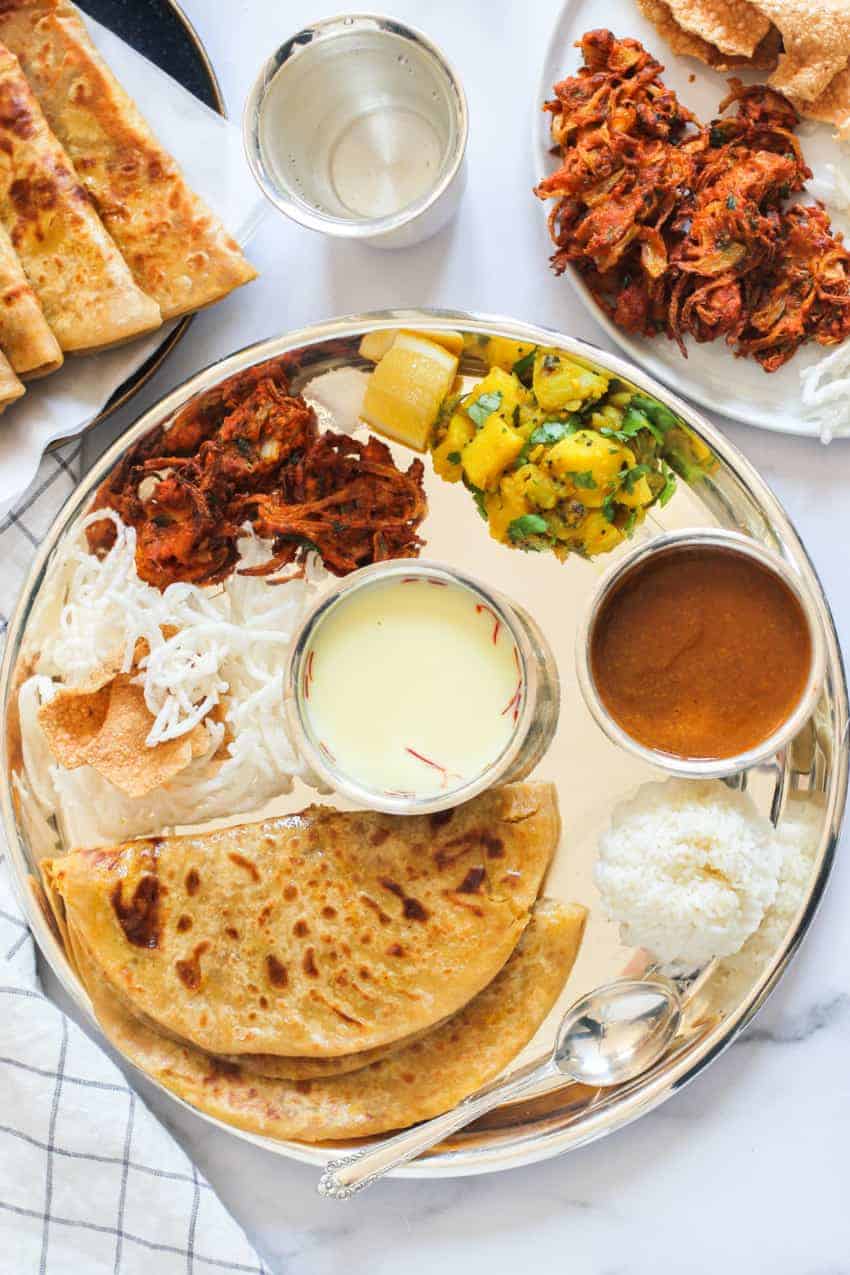 Traditional Thali with Puran Poli and sides