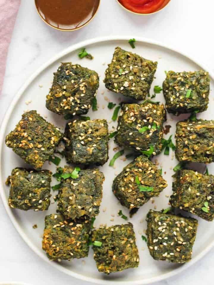 Kothimbir Vadi served in a white plate