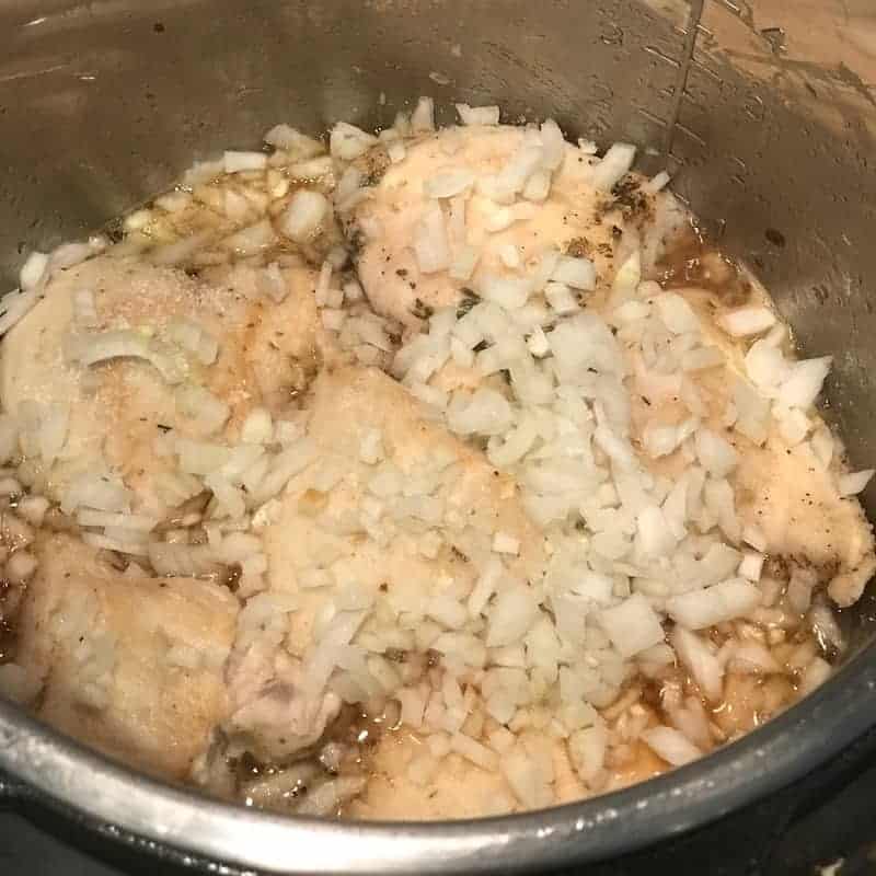 chicken layered with onions in the Instant Pot 