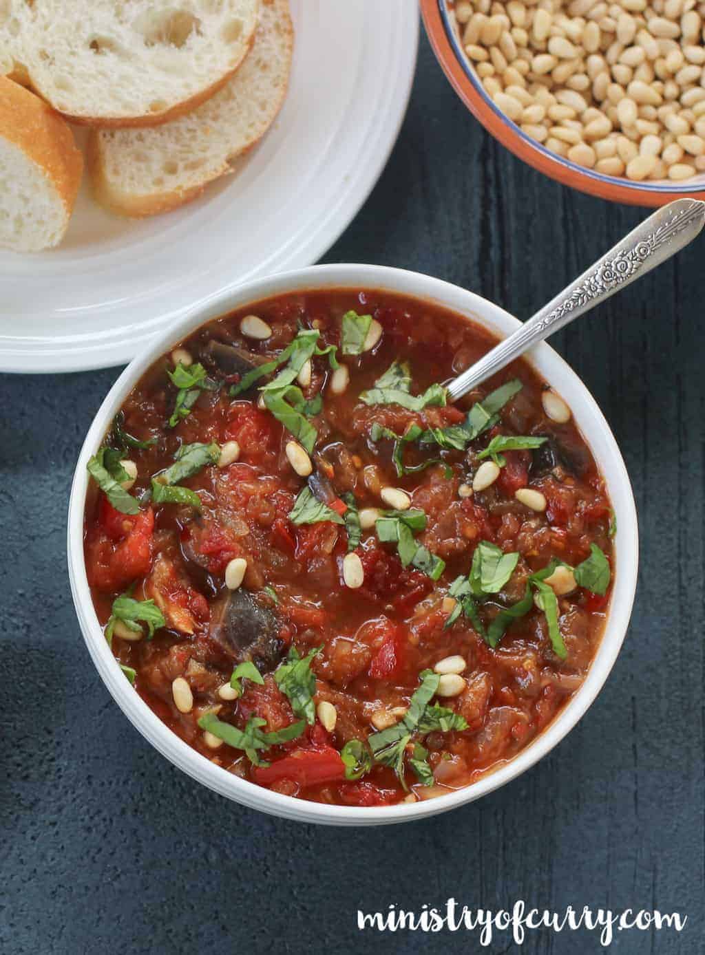 Eggplant and Red Pepper Spread in a white bowl 