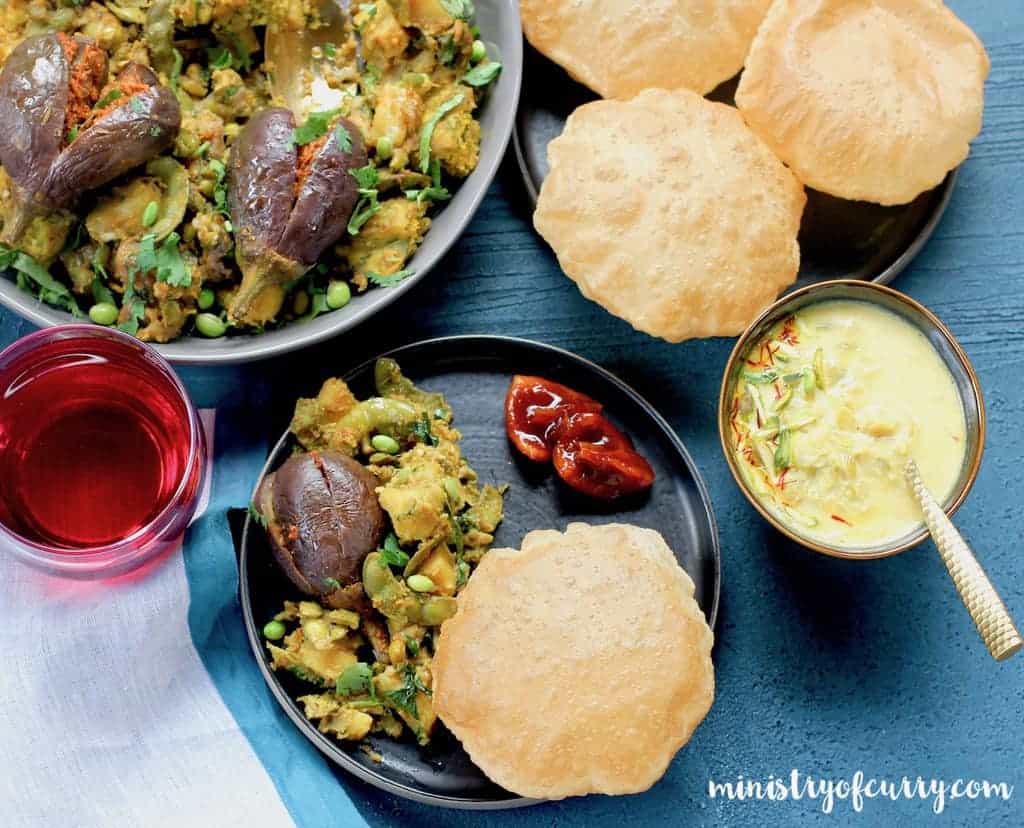 Undhiyu served with puri and basundi 