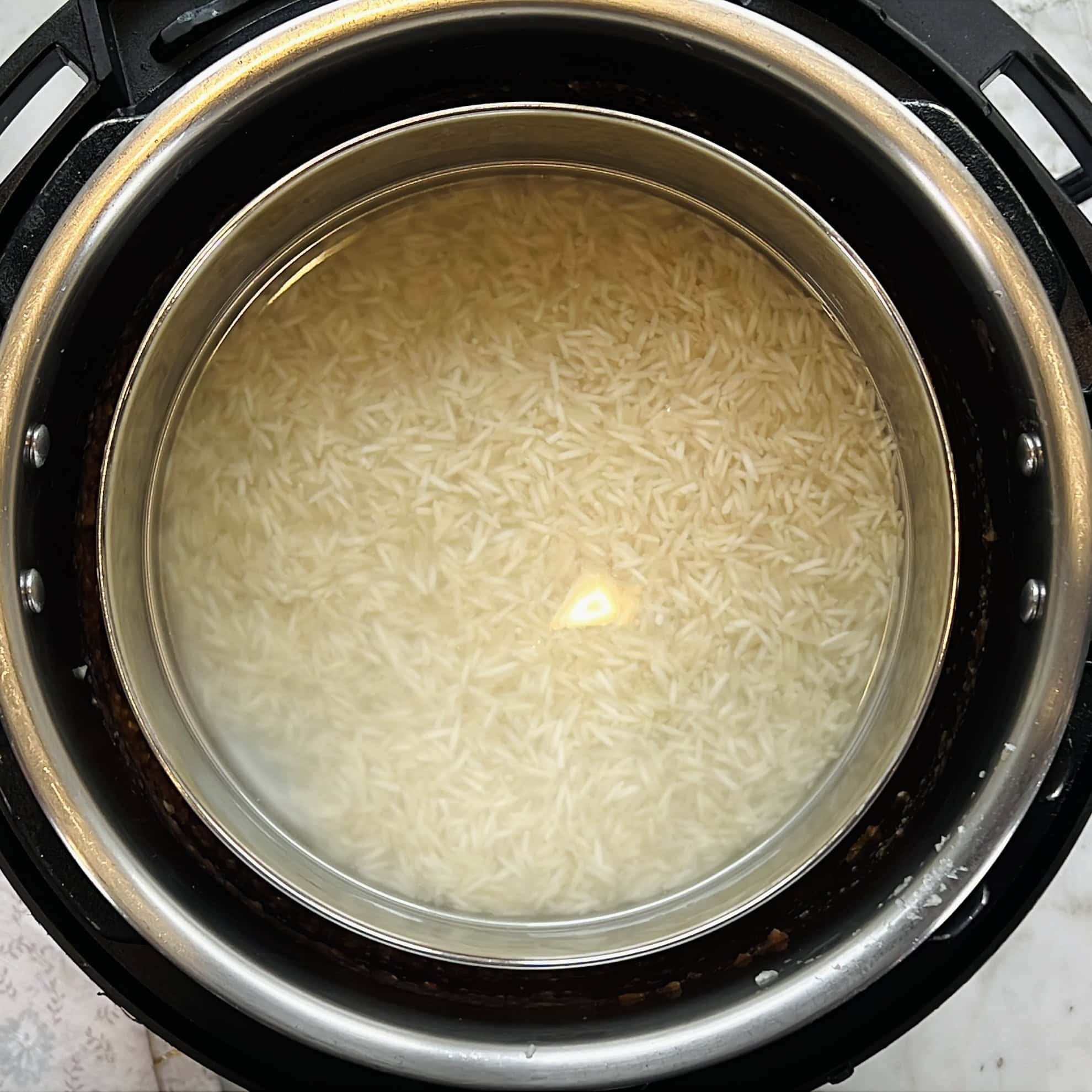 making pot in pot rice in the Instant Pot.