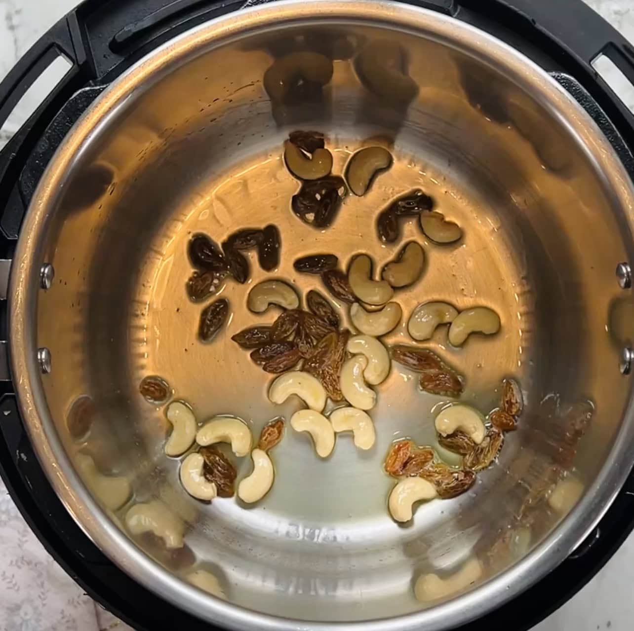 sauteeing cashews and raisins in the Instant Pot.