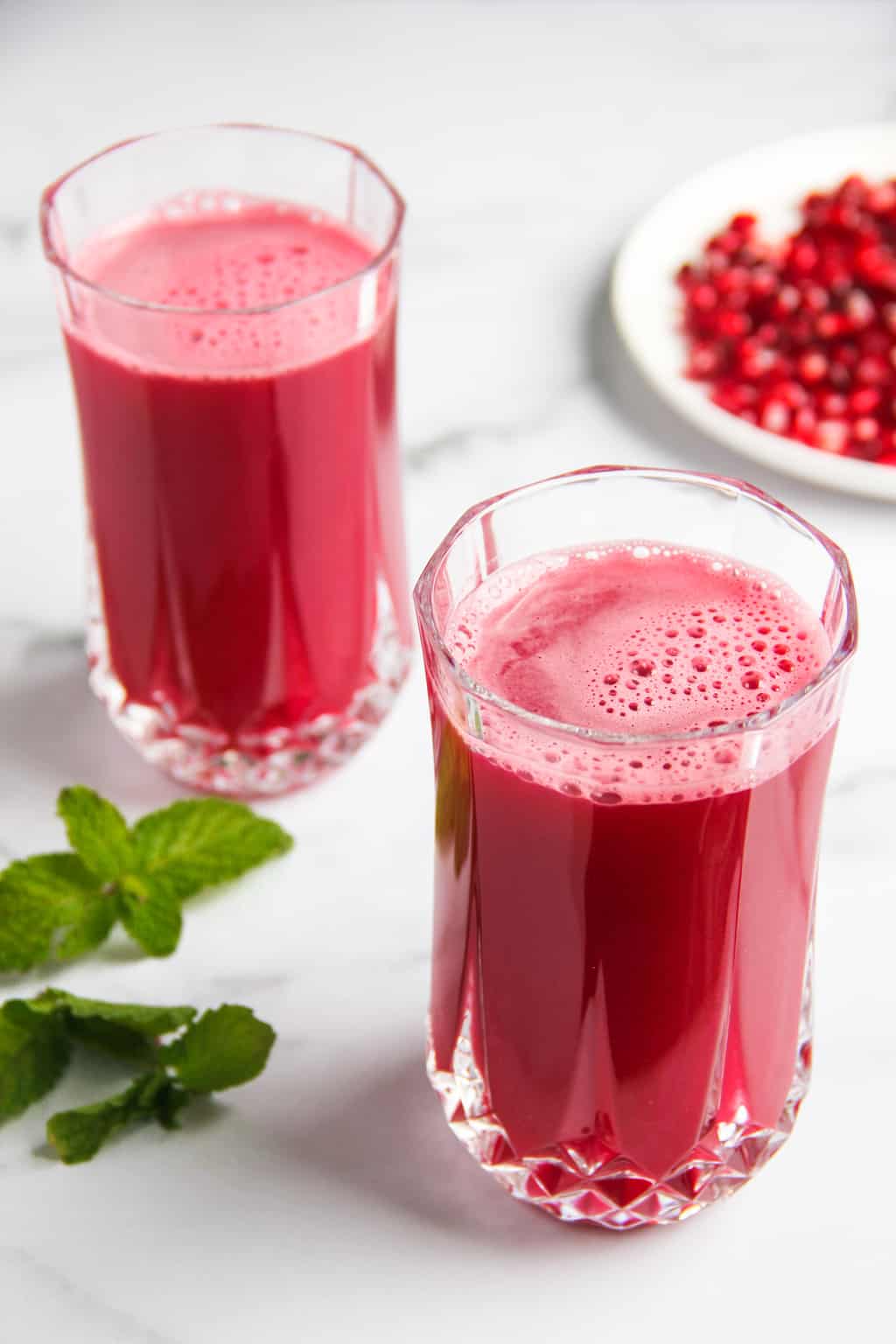 pomegranate juice in 2 glasses