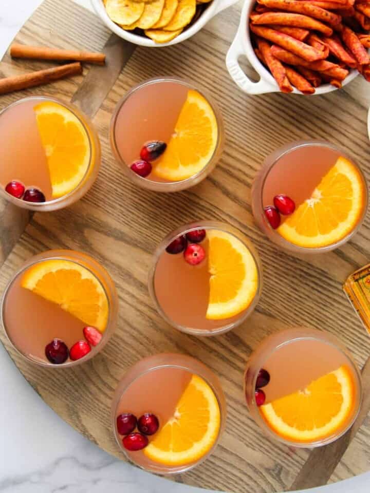 warm apple cider served in multiple cups