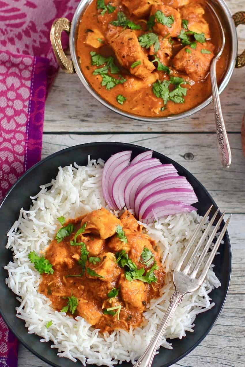 butter chicken served with basmati rice 