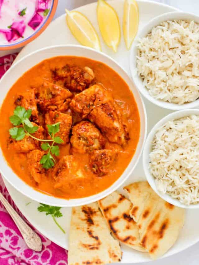 chicken tikka masala served with rice and naan