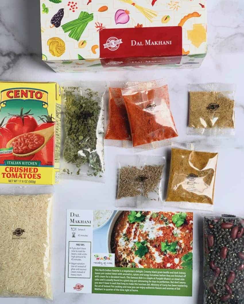 Daal makhani pantry kit with all the spices and ingredients laid in front 