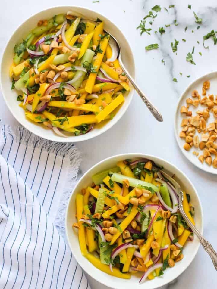 Mango Salad served in 2 white bowls