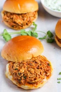 pulled chicken served on brioche bun