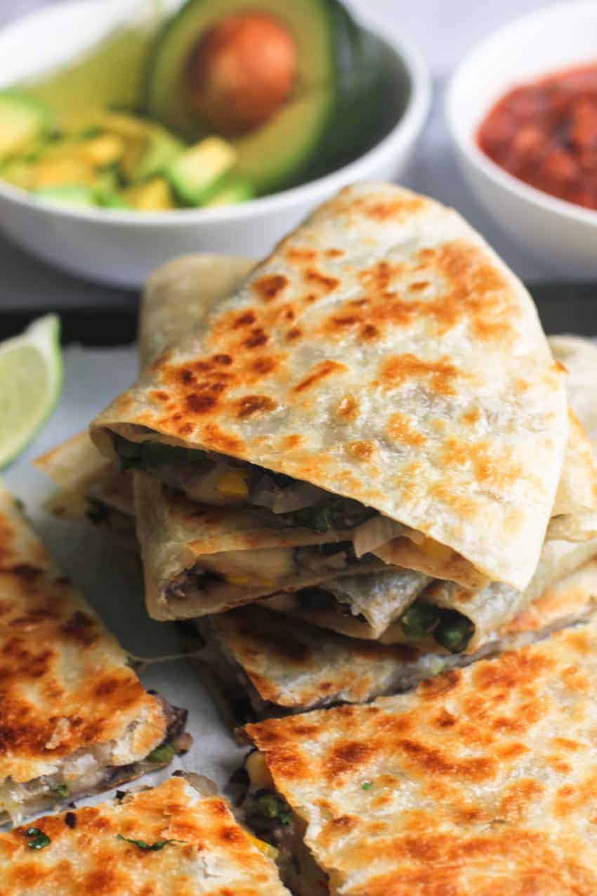corn and bean quesadillas stacked 