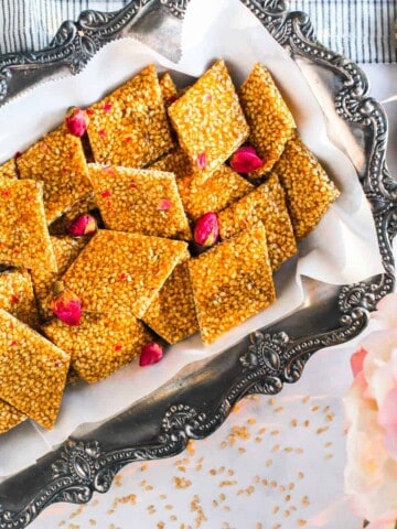 til chikki in a silver tray