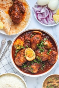 Doro Wot served with rice and paratha
