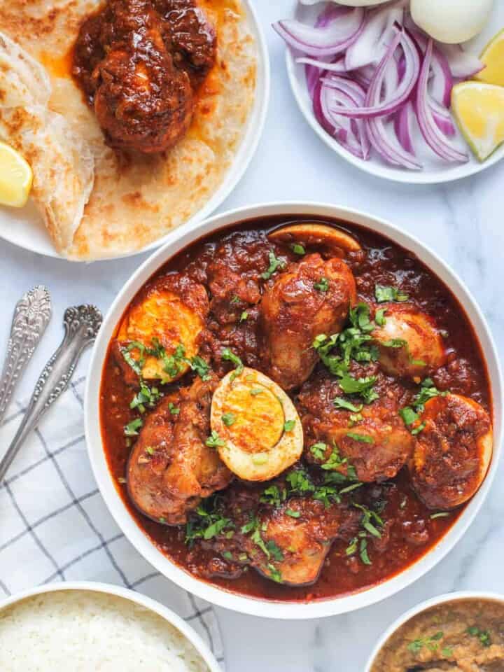 Doro Wot served with rice and paratha