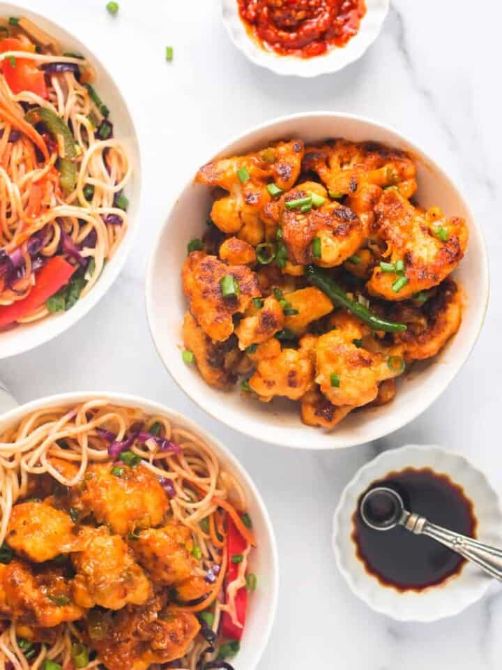 Gobi Manchurian served over hakka noodles