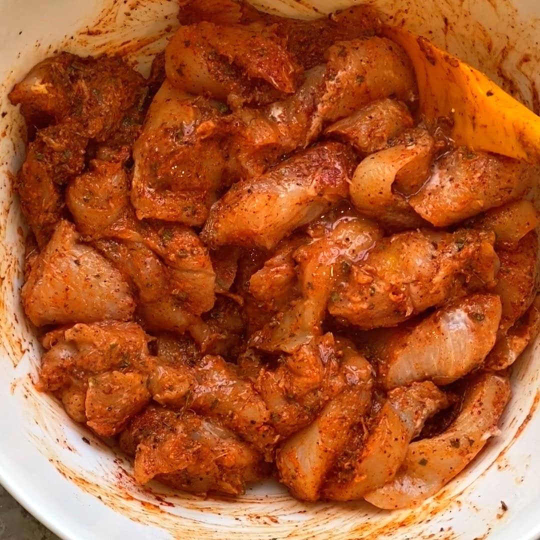 marinated chicken in a bowl.