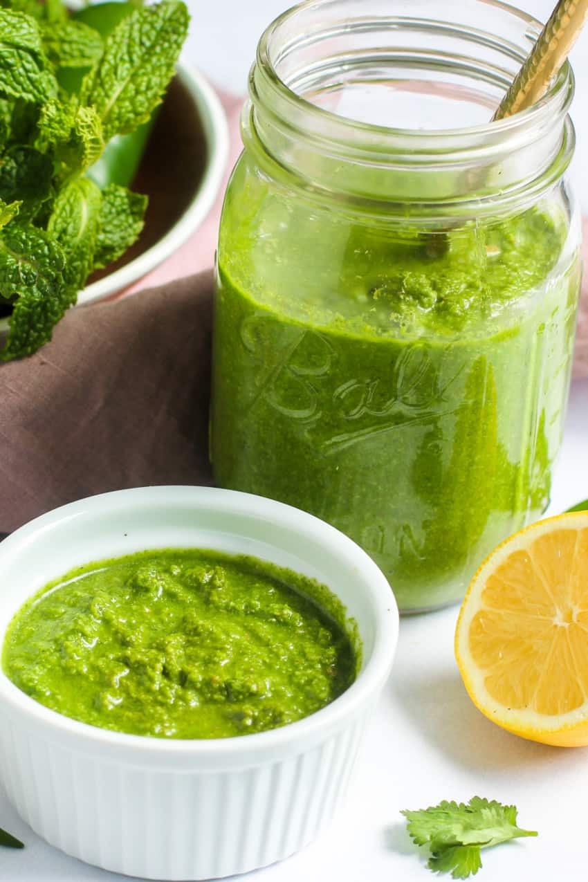 Cilantro Mint Chutney in a bowl and glass jar 