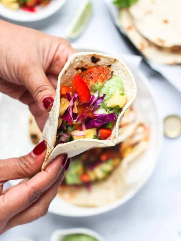 fish taco in hands