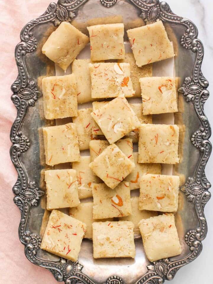 badam burfi in a tray
