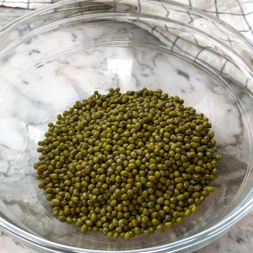 dry mung beans in a glass bowl 