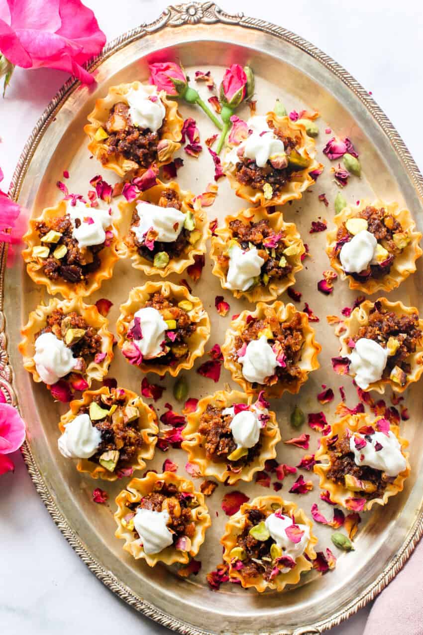 Fig halwa served in phyllo cups with whip cream 