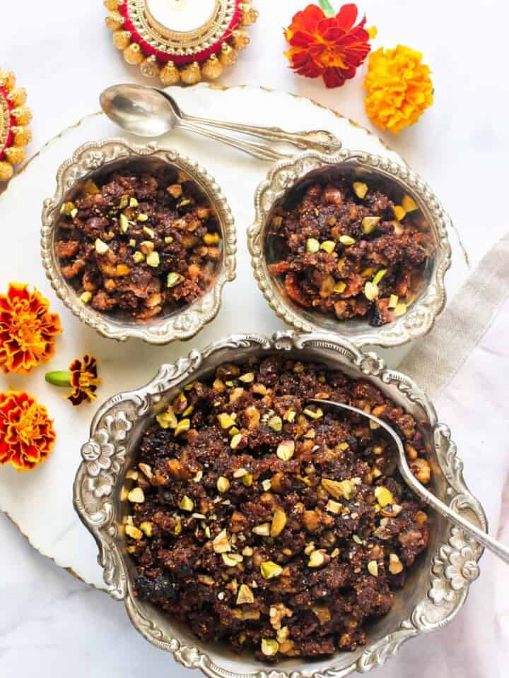 fig halwa served in silver bowls