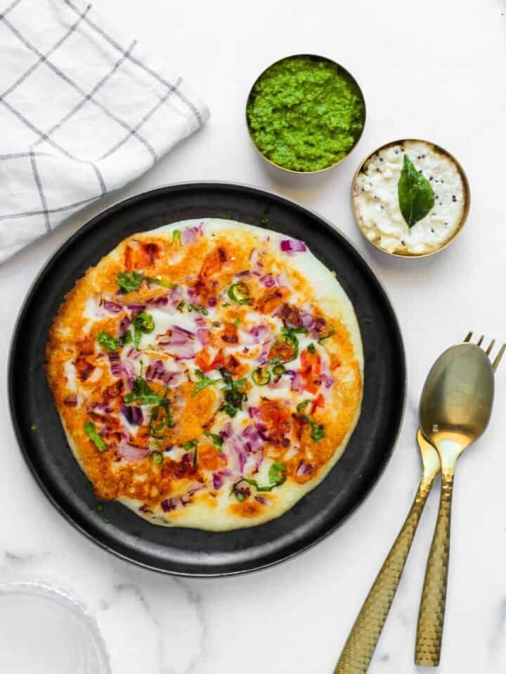 Uttapam served with cilantro chutney and coconut chutney