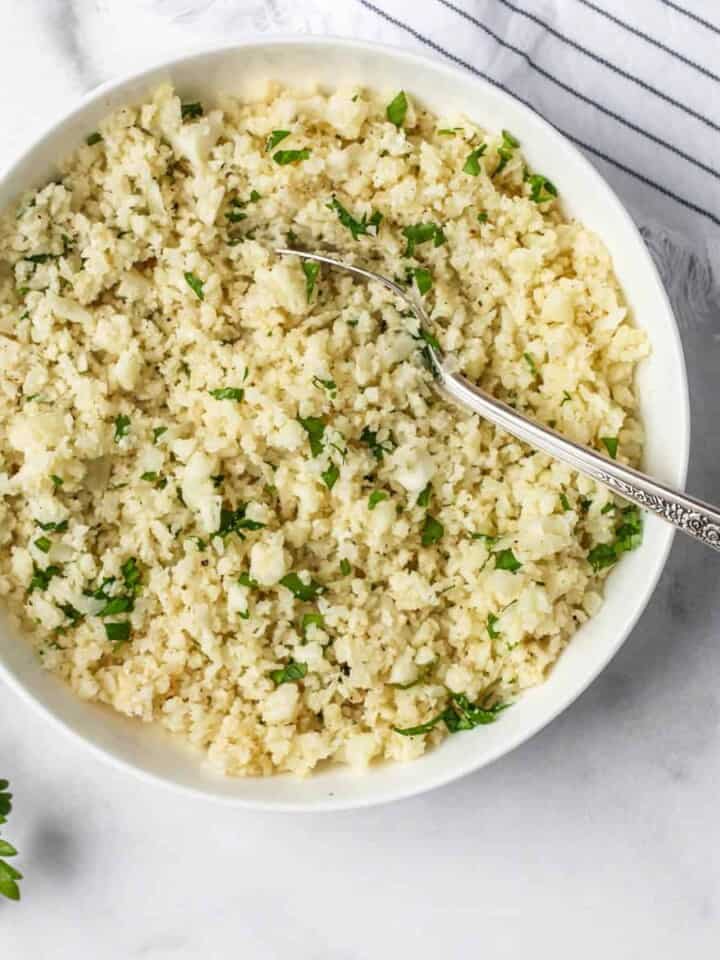 caulifower rice served in a white bowl