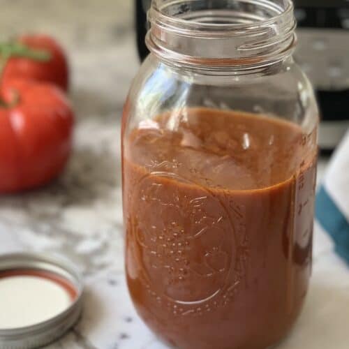 Enchilada sauce in a glass jar