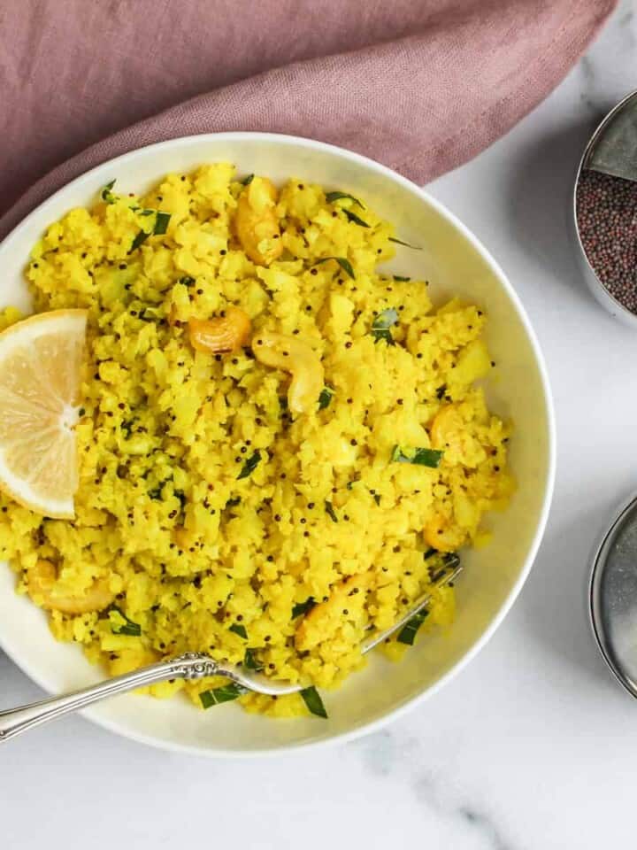 lemon cauliflower rice served in a white bowl